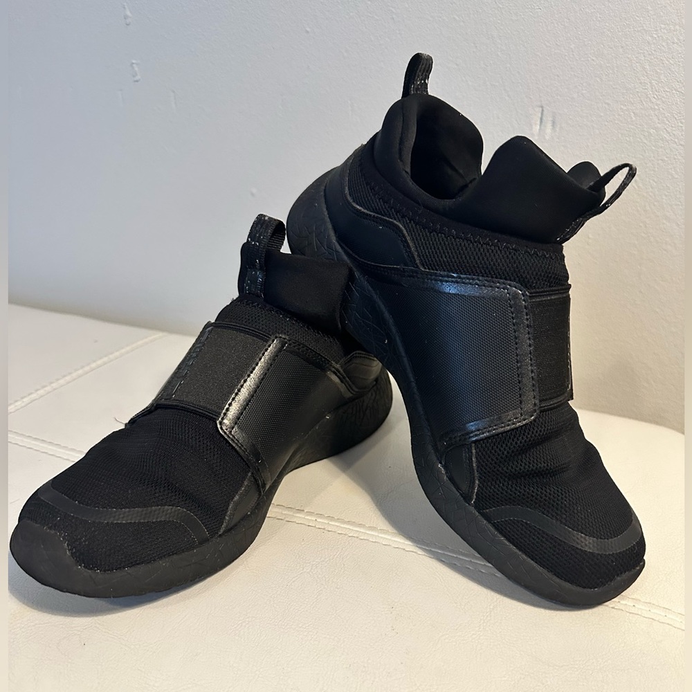 Sketchers slip-on sneakers.